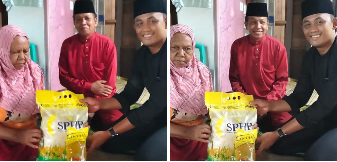 Penyaluran Bantuan Sosial Beras dan Minyak di Desa Pambang Pesisir Berjalan Lancar
